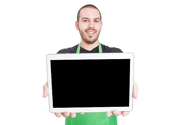 istock Selective focus of market employee showing black screen tablet 599993402