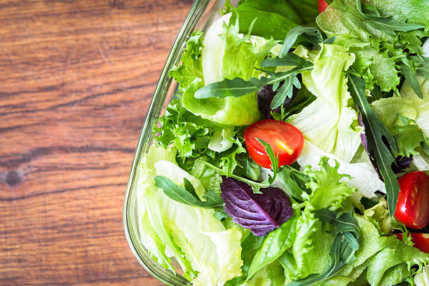 istock Green summer salad with cherry tomatos 599994238