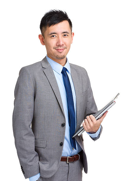 istock Chinese businessman holding a clipboard 599994268
