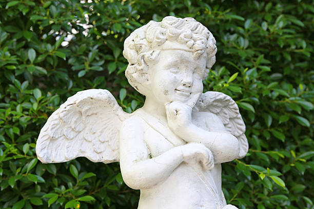 istock Cupid sculpture in the garden 599994952
