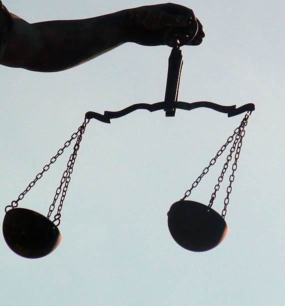 istock View Of Lady Justice Large Hand Holding Weight Scale 599995896