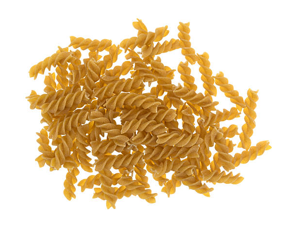 istock Fusilli whole wheat organic pasta on a white background 599996304