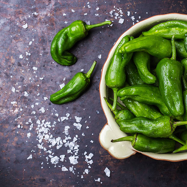 istock Raw green peppers pimientos de padron traditional spanish tapas 599997692