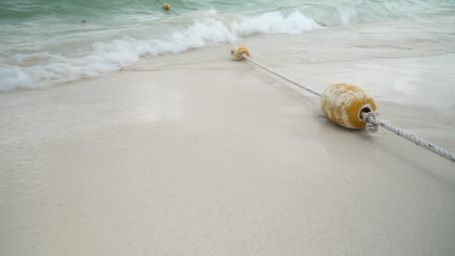 yellow buoy on the sea