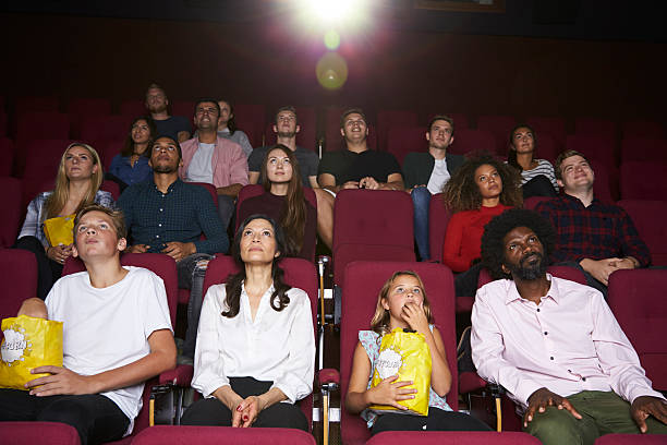 istock Audience In Cinema Watching Film 600055702