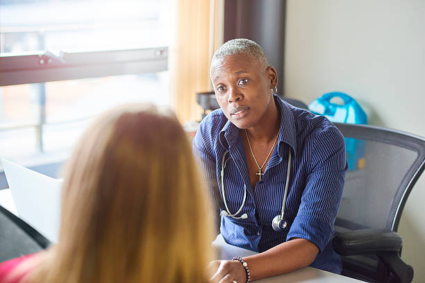 istock Doctor and female patient 600055806