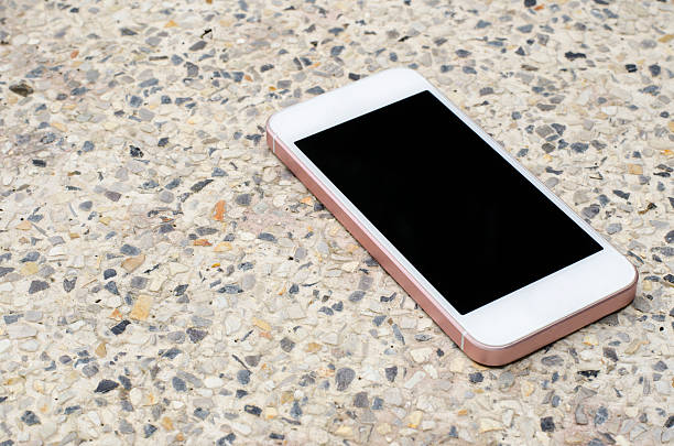 istock smartphone on the gravel, 600056098