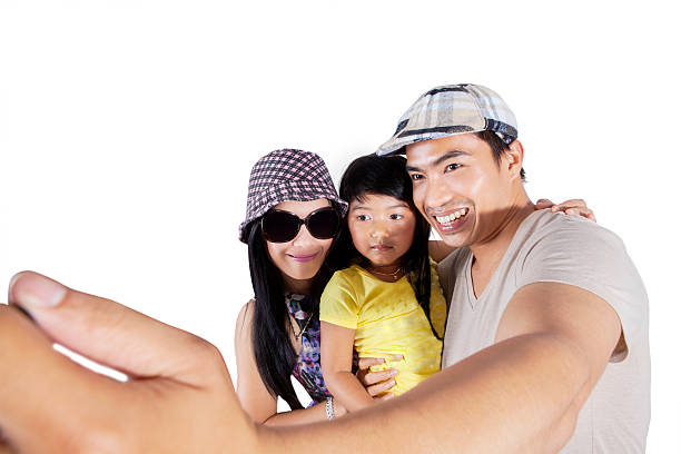 istock Cheerful family taking selfie in studio 600056702