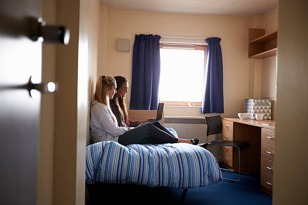 istock Female Students Working In Bedroom Of Campus Accommodation 600057836