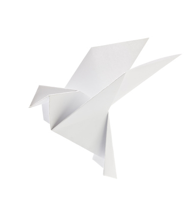 White pigeon of origami. Isolated on background