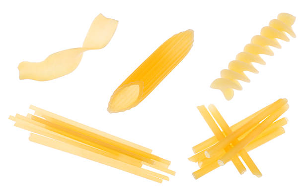 istock set of golden macaroni isolated on white 600059002