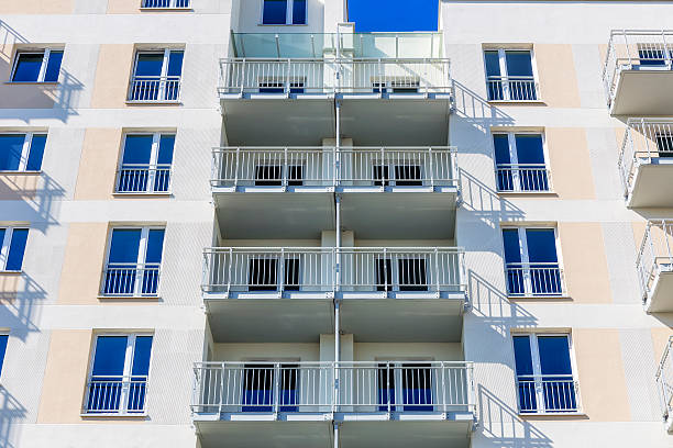 istock Balconies in white modern apartment building 600060140