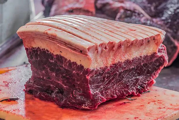 Freshly caught Minke Whale for Sale at a Butcher in Nuuk, Greenland. This is a seasonal delicacy, strictly regulated by a government quota system, that allows the Inuit population to continue its special culinary tradition