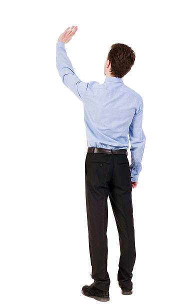 istock Back view of beautiful business man welcomes. 600062264