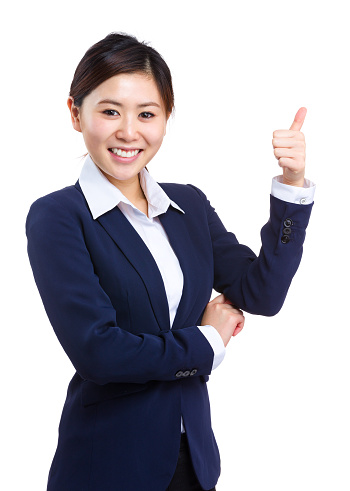 Chinese businesswoman giving a thumbs up