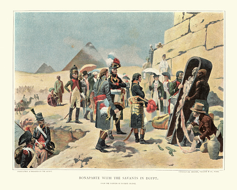 Vintage lithograph of Napoleon Bonaparte in egypt viewing a egyptian mummy. From the painting by Maurice Orange