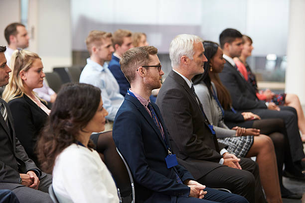 istock Audience Listening To  Speaker At Conference Presentation 600072166