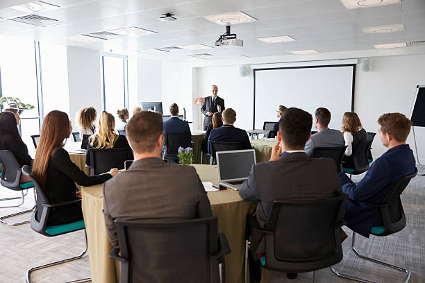 istock Mature Businessman Making Presentation At Conference 600072596