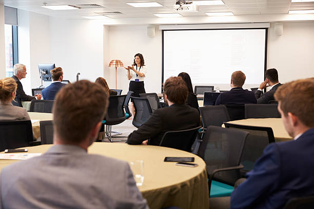 istock Businesswoman Making Presentation At Conference 600072634