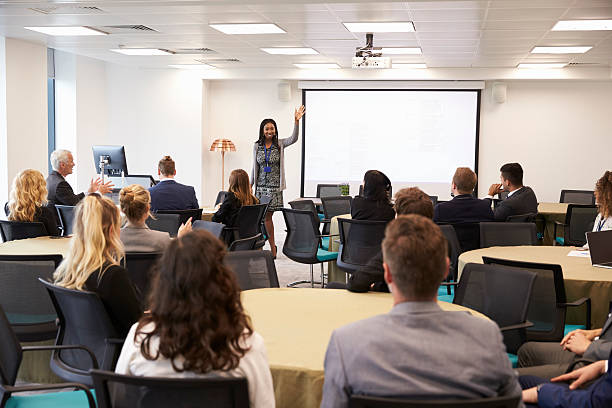istock Businesswoman Making Presentation At Conference 600072742