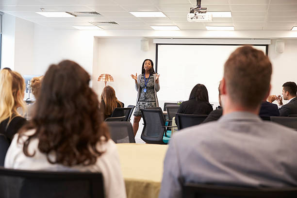 istock Businesswoman Making Presentation At Conference 600072778