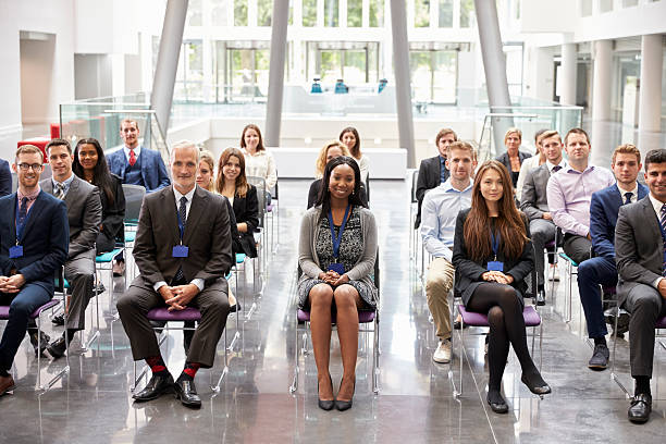 istock Audience Listening To  Speaker At Conference Presentation 600072830