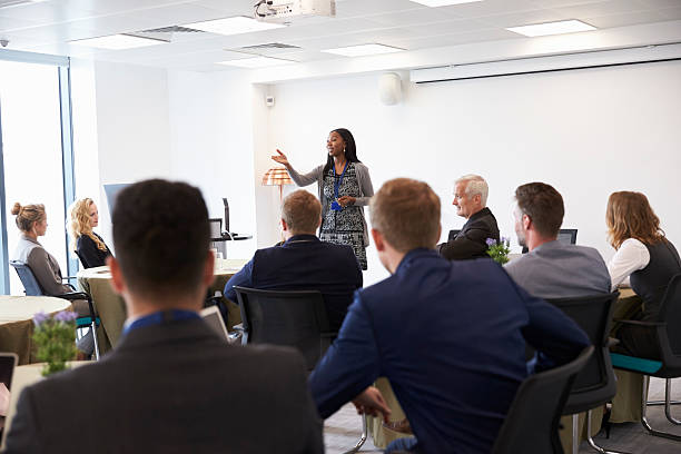istock Businesswoman Making Presentation At Conference 600073808