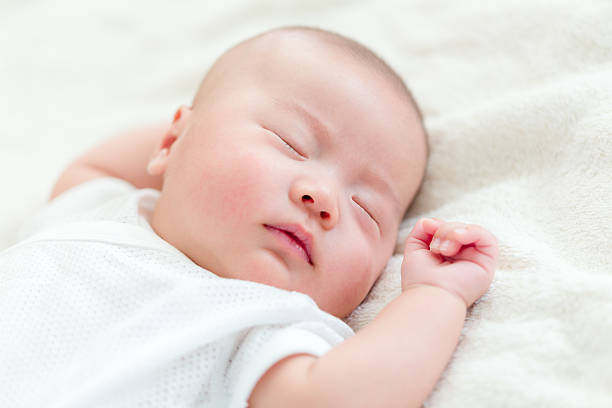 istock Close-up of sleeping newborn 600075704