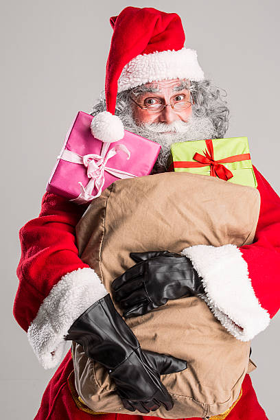 istock cheerful funny traditional santa claus 600076486