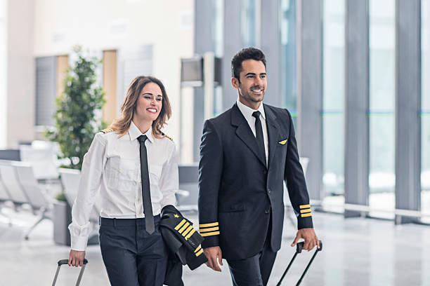 istock Pilots walking in the airport terminal. 600081732