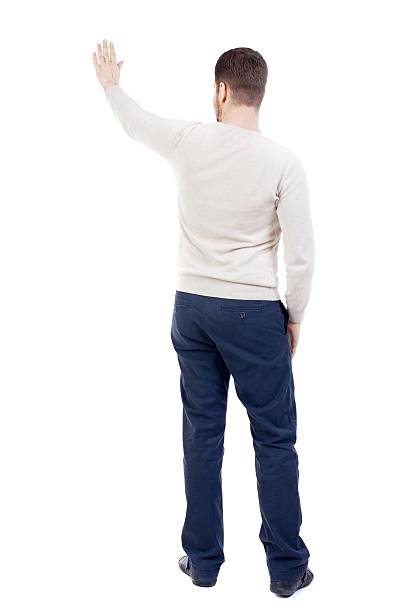 istock Back view of beautiful business man welcomes. 600082084