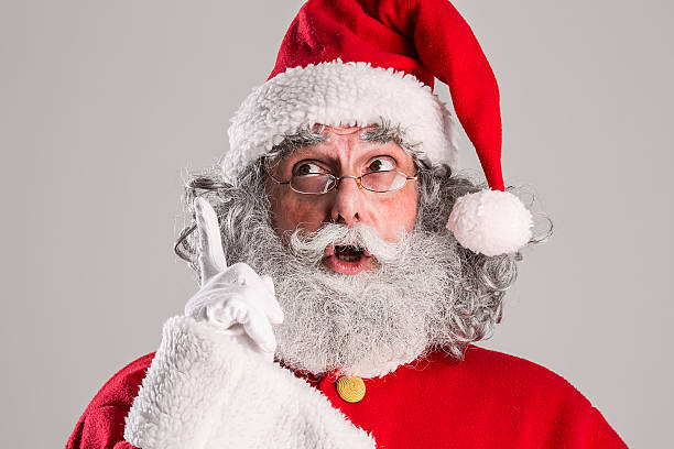 istock cheerful funny traditional santa claus 600083342