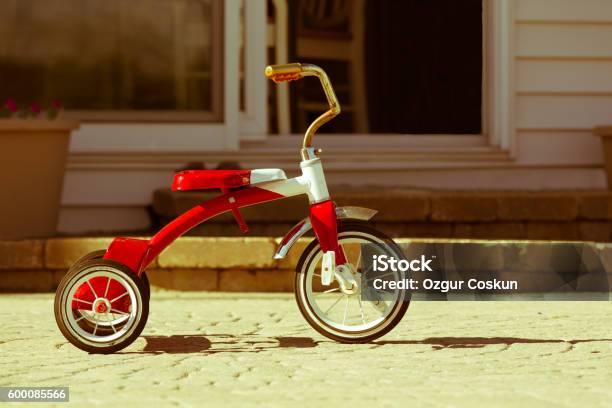 Childs Rusted Red Tricycle Standing Ready Stock Photo - Download Image Now - Bicycle, Tricycle, Childhood