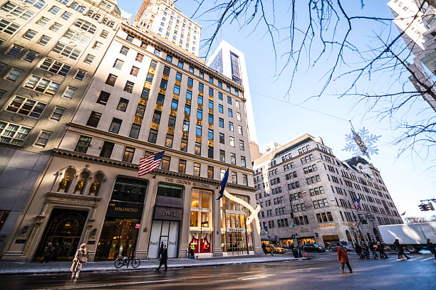 fifth avenue with luxury shops and people walking, nyc - bulgari imagens e fotografias de stock