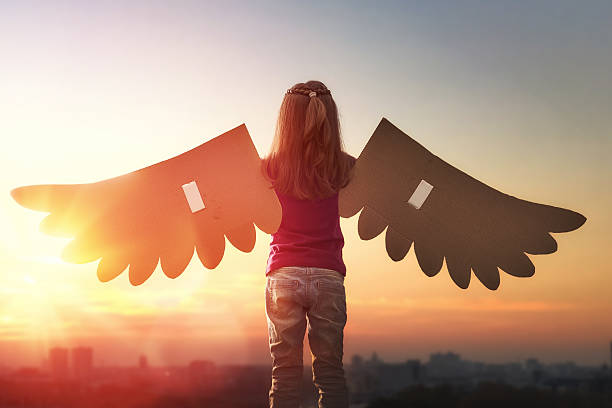 istock Kid with the wings of a bird 600087818