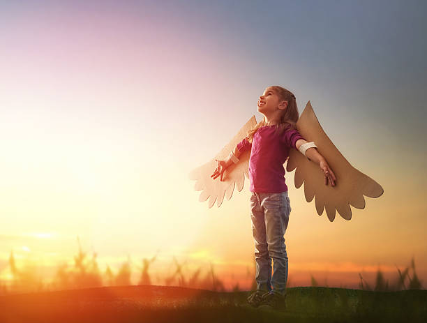 istock Kid with the wings of a bird 600087992