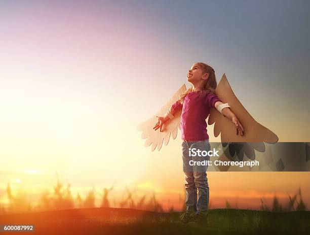 Kid With The Wings Of A Bird Stock Photo - Download Image Now - Child, Playing, Activity