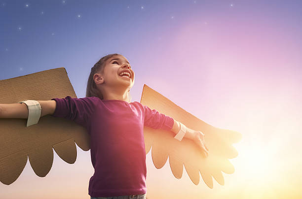 istock Kid with the wings of a bird 600088296