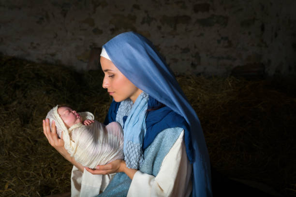 istock Virgin Mary holding baby Jesus 600090020