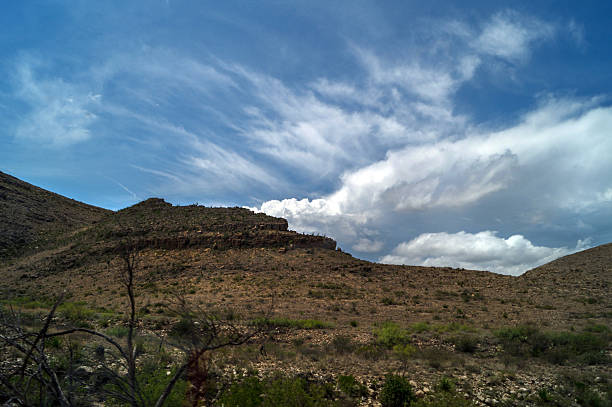 istock landscape with clouds, hills and foliage, New Mexico 600090400