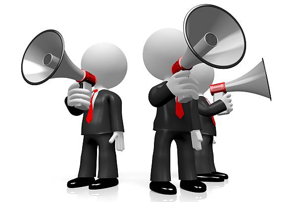 istock 3D businessmen with megaphones 600090436