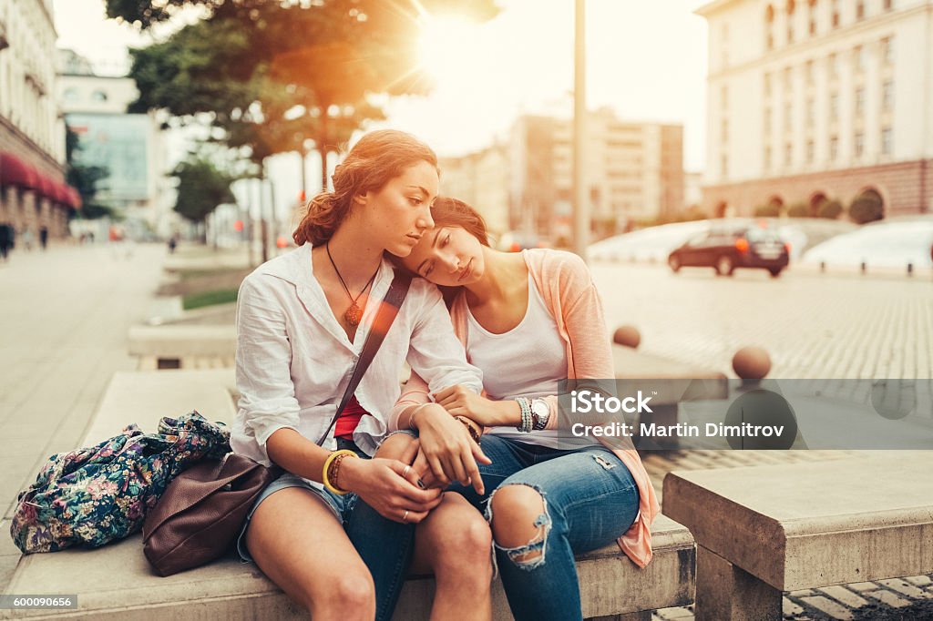 Depression in women Unhappy girls outside Friendship Stock Photo