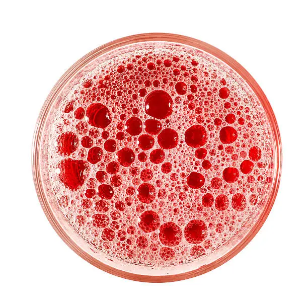 Photo of Top view of red frothy drink