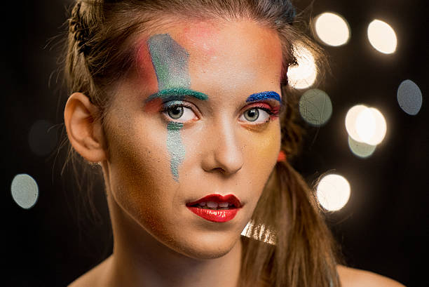 istock Young woman portrait. Model with make up, decorative lighting bokeh 600091288