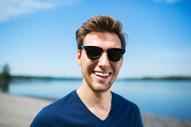 istock Happy man at the lake 600092694