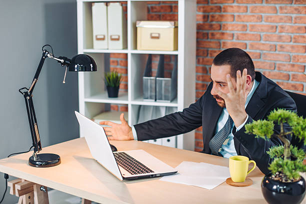istock Angry businessman at office 600095870