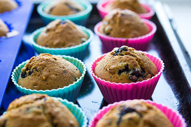 istock homemade blueberry muffins with berries closeup in baking cups 600098578