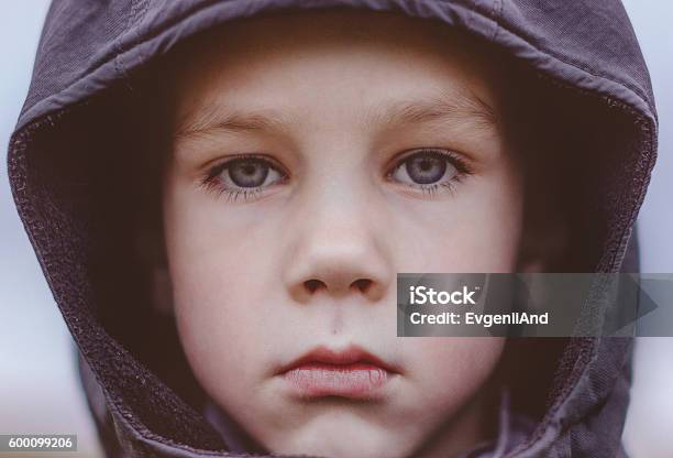 Sad Boy In A Black Hood Closeup Stock Photo - Download Image Now - Child, Close-up, Human Face