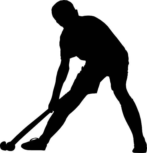 istock Silhouette of boy hockey player playing corner ball 600099716