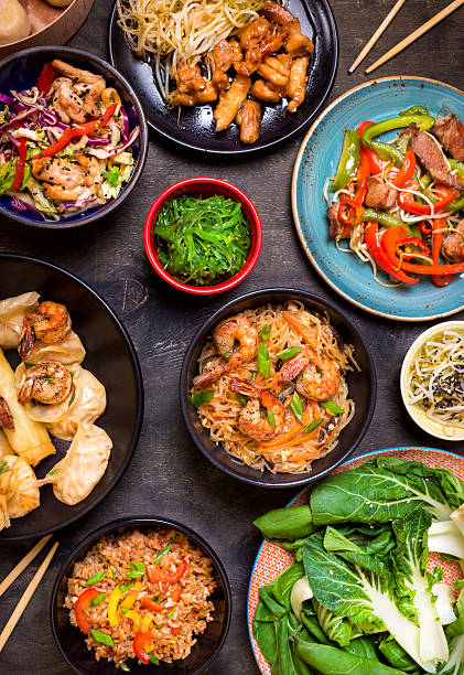 istock Chinese food on a dark table 600101182